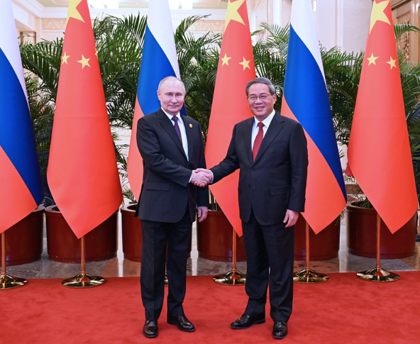 国务院总理李强在北京人民大会堂会见来华进行国事访问的俄罗斯总统普京